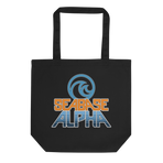 Orange and blue SeaBase Alpha logo with The Living Seas Pavilion icon above, on a Black tote — flat lay