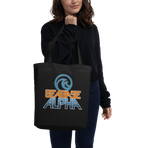 Orange and blue SeaBase Alpha logo with The Living Seas Pavilion icon above, on a Black tote — worn stylishly by a model