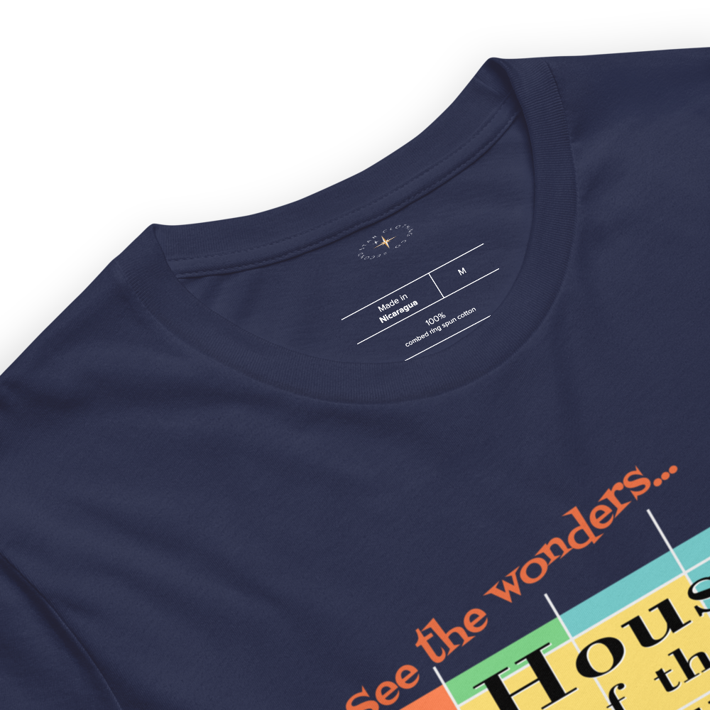 Logo inspired by the former attraction, House of the Future, with retro-styled text reading "See the Wonders of Fantastic Plastic!", on a Navy tee — fabric detail