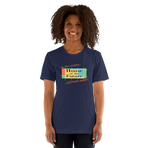 Logo inspired by the former attraction, House of the Future, with retro-styled text reading "See the Wonders of Fantastic Plastic!", on a Navy tee — worn stylishly by a model