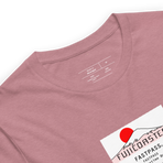 Imagined FASTPASS designed for the unbuilt Fujicoaster ride, with white-and-red-toned attraction logo, on a tee — fabric detail