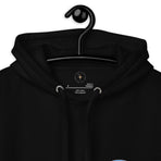 A logo for the classic EPCOT attraction, Horizons, text displaying with a sharp horizon line running through it, gradient to sky above and earth below., on a Black hoodie — label closeup